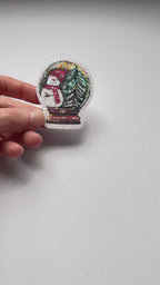 Sticker de Noël holographique – Boule à neige et bonhomme de neige